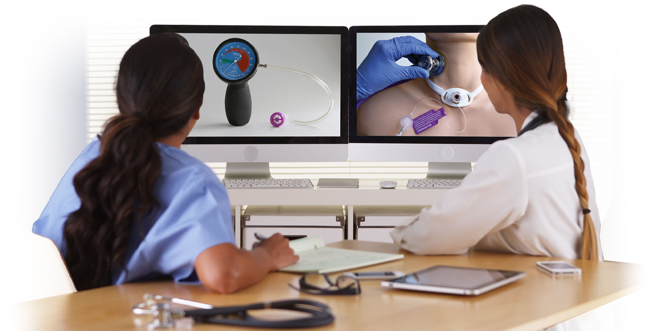 Clinicians reviewing a live webinar together